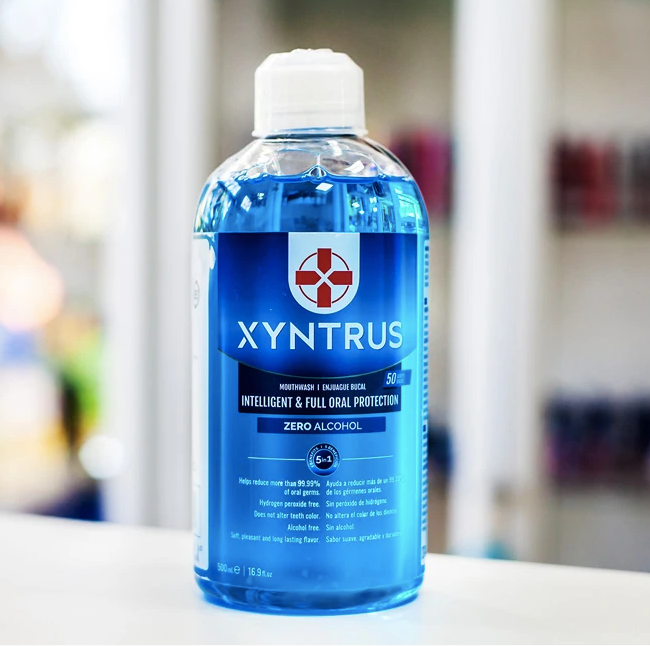 Xyntrus Bioenjuague bucal 99.9% de efectividad contra virus, gérmenes y bacterias.